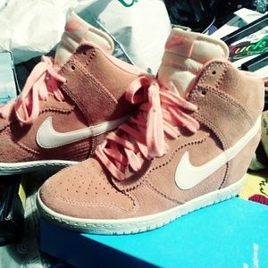 Coral colored Nike Women's Dunk Sky High Trainers